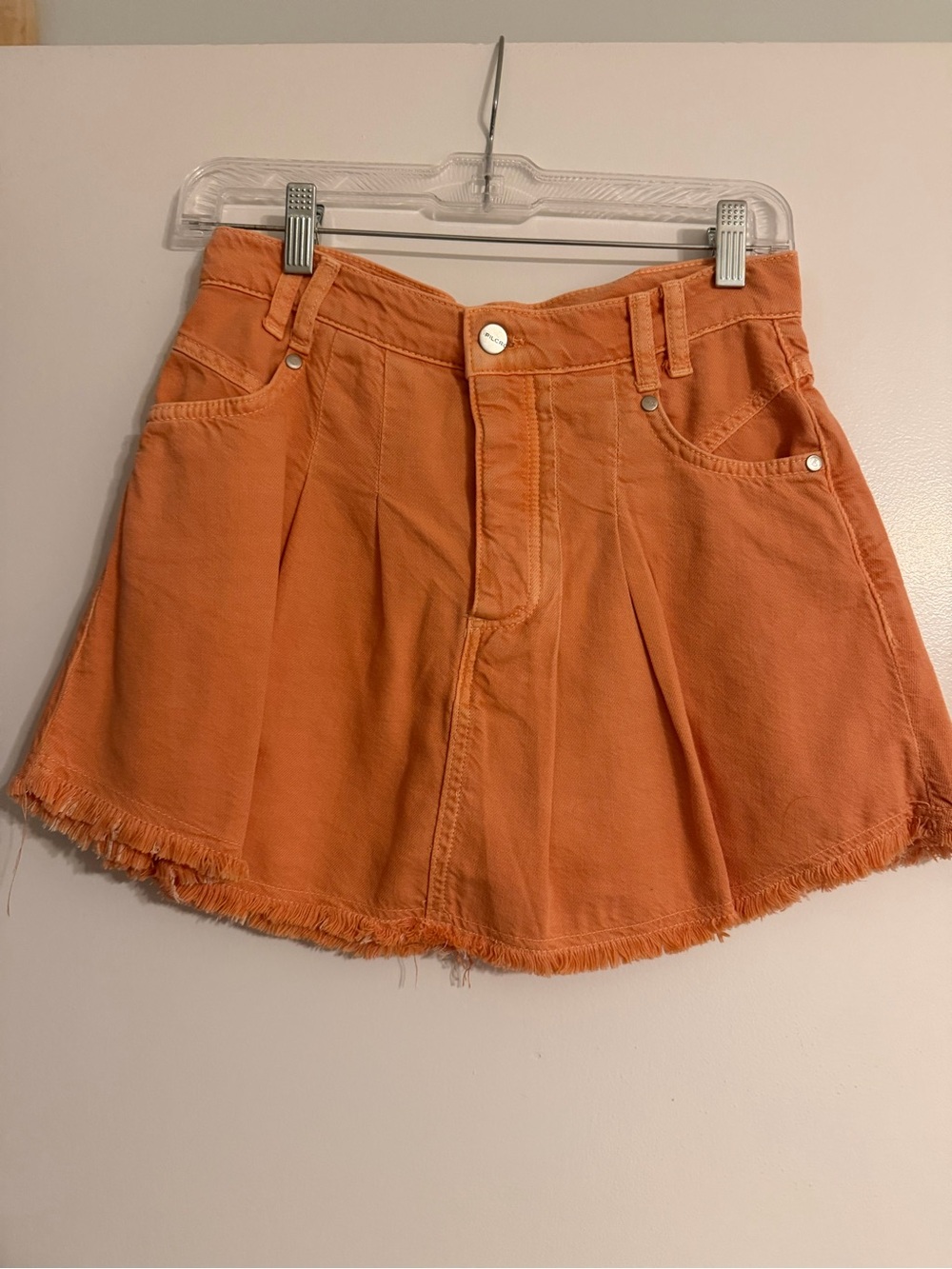 Pilcro Orange Pleated Denim Skort with Frayed Hem